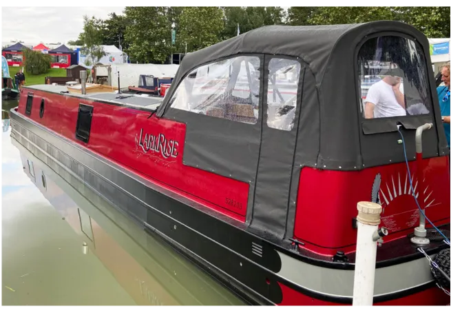 A red narrowboat named 