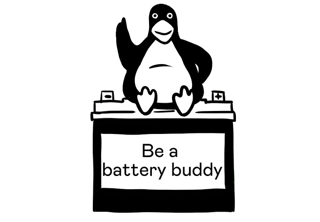 A cartoon penguin stands on a battery with a sign saying 